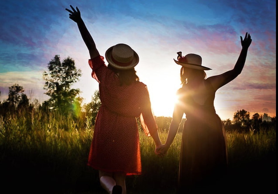 Friends enjoying a sunset together
