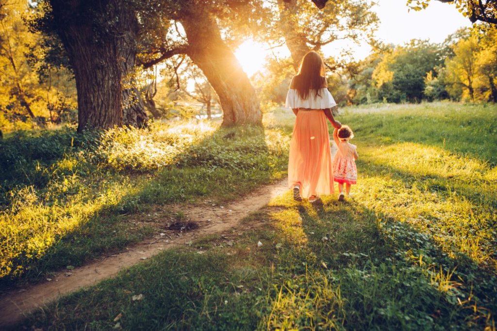 Mother and child walking together